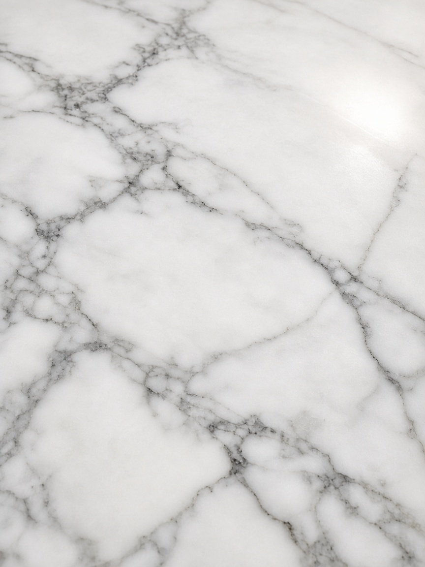 Polished Carrara marble surface with natural veining